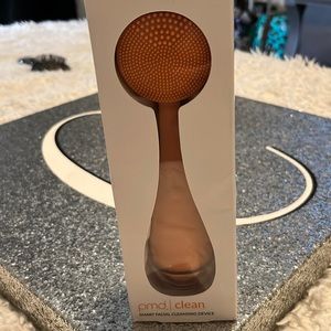 peach facial cleaning device